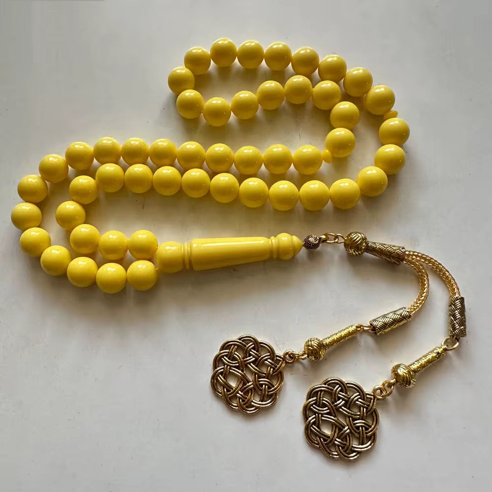 مسباح اصفر كركوشة ذهبية